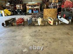 8 Vintage Soap Box Derby Cars. Different construction styles from 1939-1990