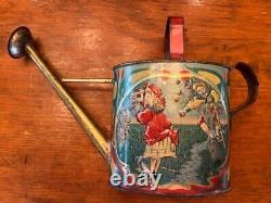 Antique vintage early 1900s Victorian toy metal watering can children graphics