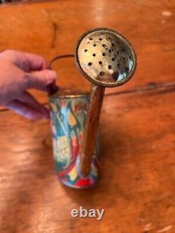 Antique vintage early 1900s Victorian toy metal watering can children graphics