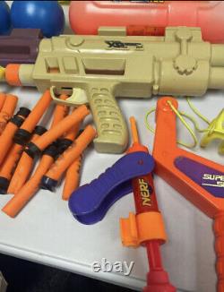 Lot of vintage 90s Nerf Guns & Super Soakers Water Guns, Toys Etc