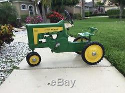 Original antique John Deere pedal tractor #130. Great condition. All original
