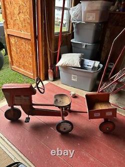 Rare, vintage, red western flyer chain pedal tractor, and wagon