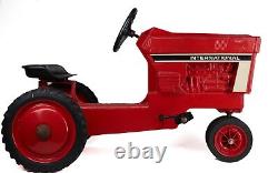Vintage 1960's Red International Ertyl pedal tractor, previously restored