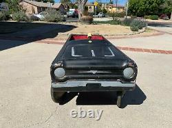 Vintage AMF Jet Sweep Pedal Car with flames