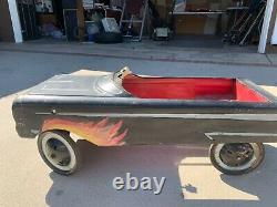 Vintage AMF Jet Sweep Pedal Car with flames