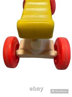 Vintage Playskool Wiggle Wagon Childs Ride On White Red Blue Yellow 4 Wheels