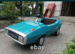 Vintage collectible pedal car USSR. Rainbow