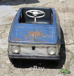 Vintage old rare metal pedal car Moskvich from Russia