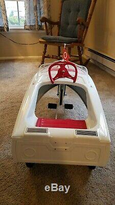 Vintage pedal car. Jolly Roger Pedal Boat