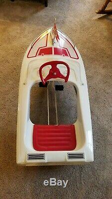 Vintage pedal car. Jolly Roger Pedal Boat